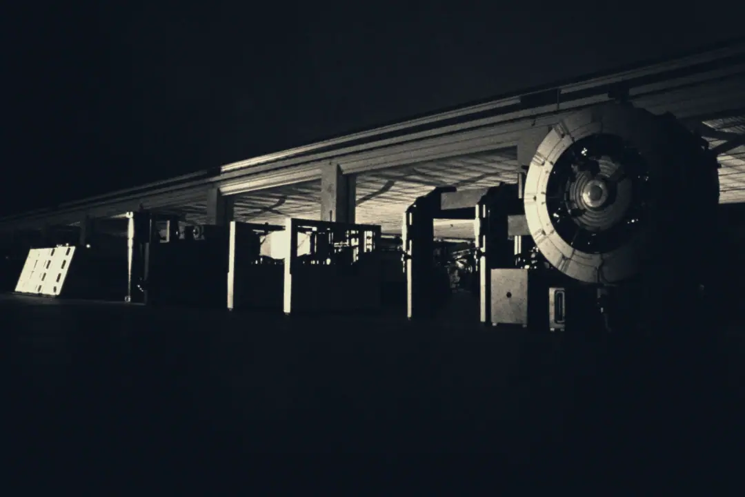 Production hall of a manufacturing company at night